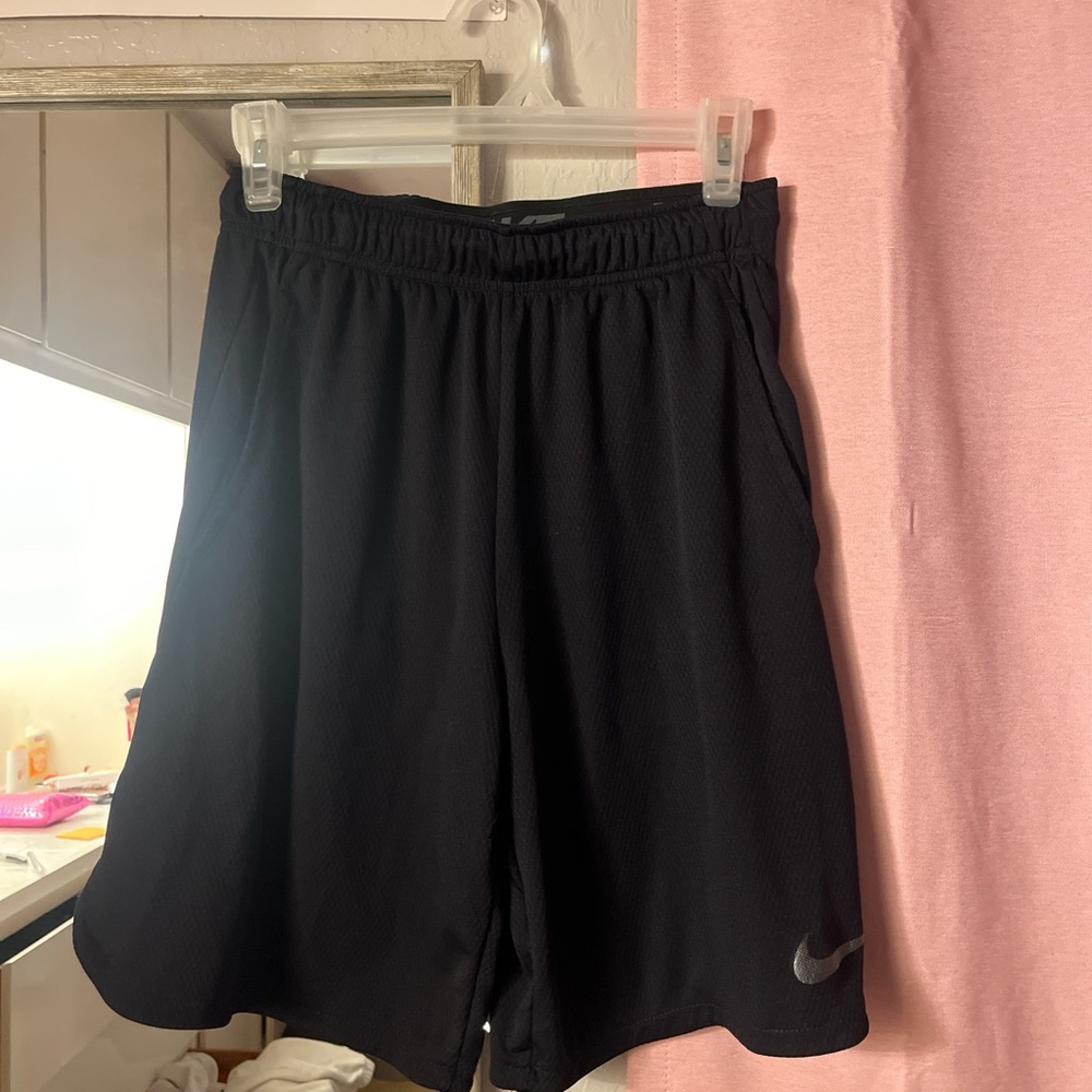 Black Nike basketball shorts. Size small.